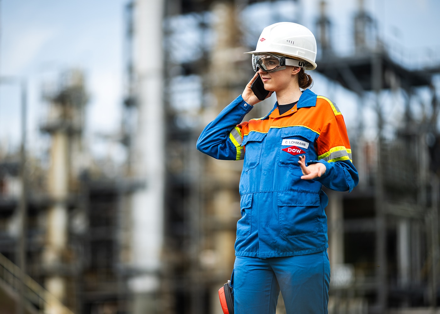 women on phone at factory