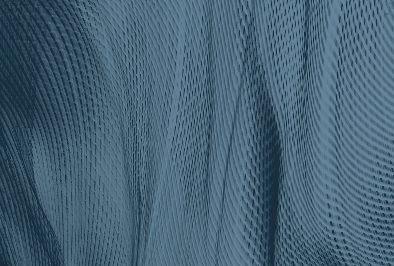 686933069 Blurred motion of blue lights creating abstract fabric effect - slate texture